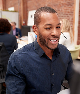 male-customer-services-agent-working-at-