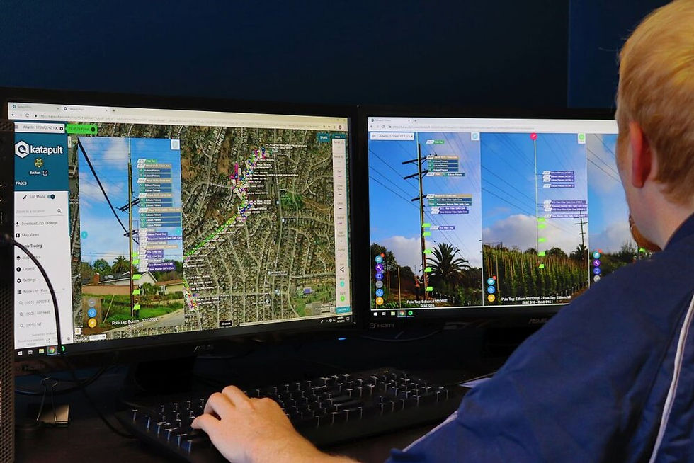 OSP design, showing two computer screens with aerial map on one and poles with calibrated heights on the other.
