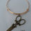 Thumbnail: Gold Bangle With Antique Gold Scissor Charm
