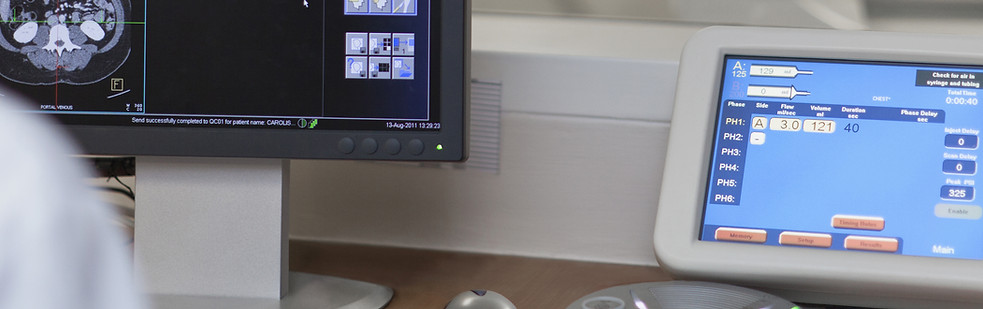 Doctor Operating CT Scanner