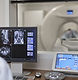 Doctor Operating CT Scanner