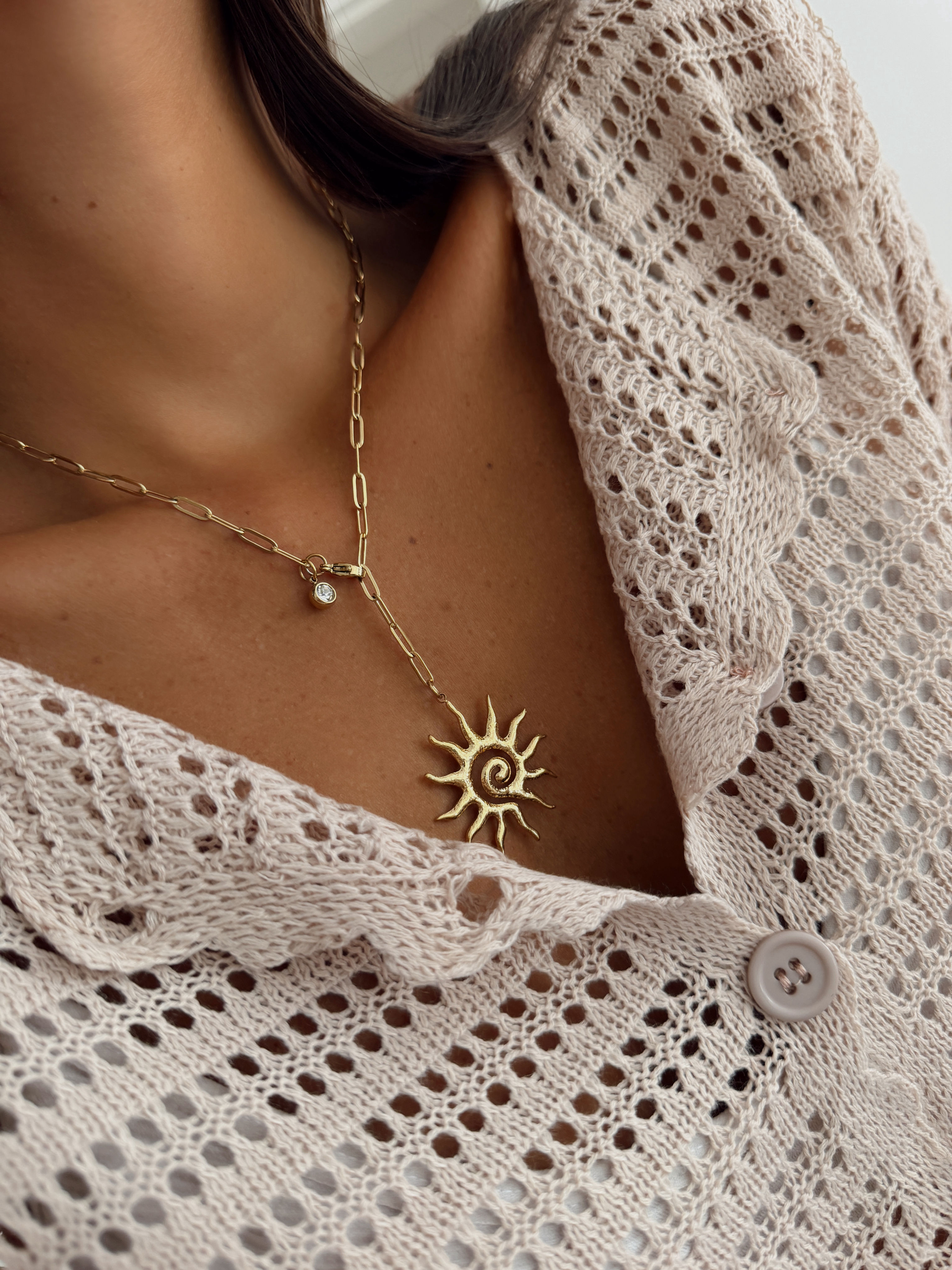 COLLAR SOL ACERO DORADO