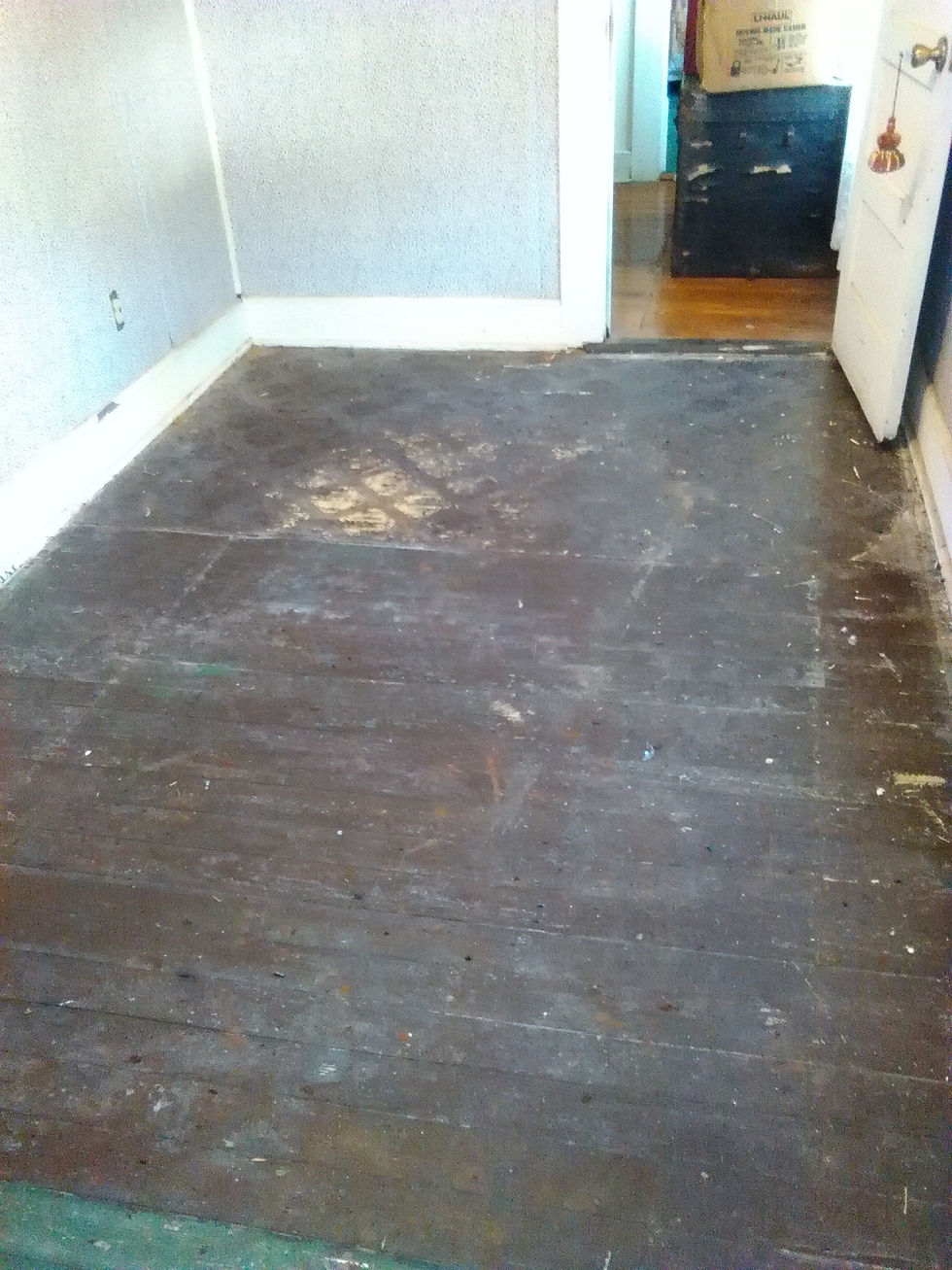 This is the same upstairs room but now the rug has been removed. I have no idea what to do with this floor