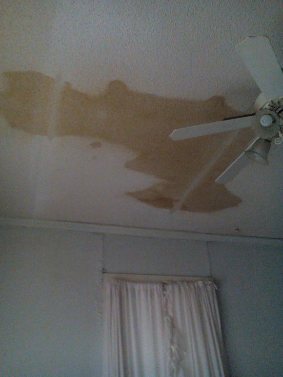 The ceiling beneath 2nd floor front room; ceiling needs to be cleaned
