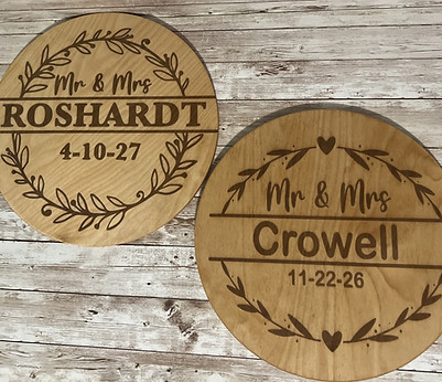 2 examples of personalized laser-engraved wooden boards for weddings.