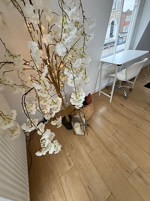 bedroom space with wood flooring