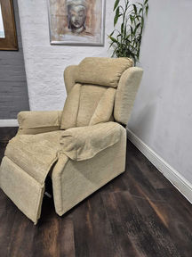 Beige recliner chair with footrest extended