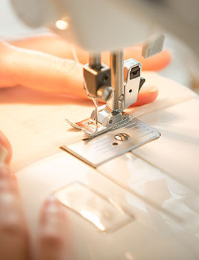 hands-sewing-machine.jpg