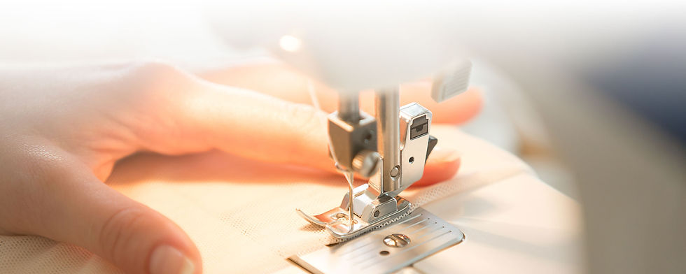 hands-sewing-machine-pano.jpg