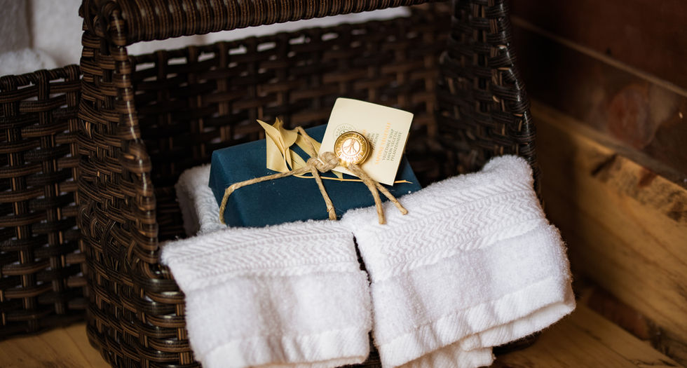 Luxury bath amenities: soap, towels, basket