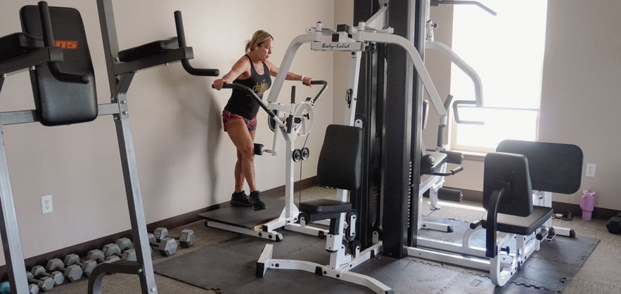 Woman exercising in fitness center