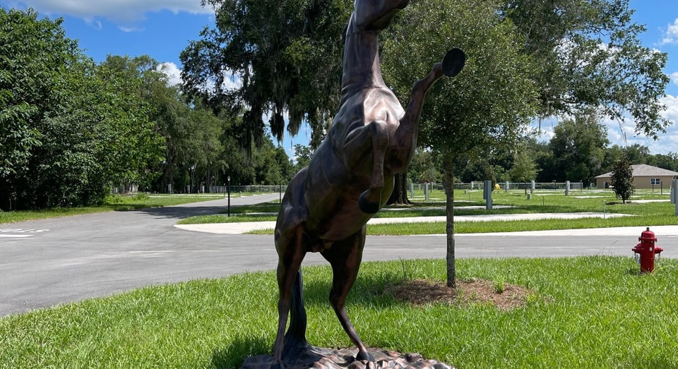 Bronze horse statue outdoors at Southern Springs