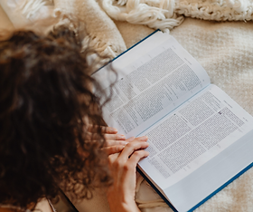 A woman reading the Bible