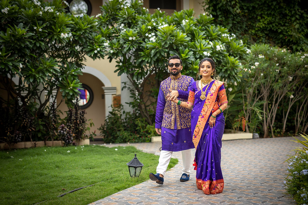 Couple in purple wedding photography attire walking outdoors
