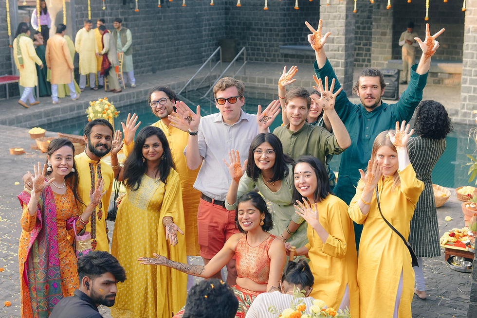 Group at Haldi ceremony, joyful wedding photography.