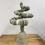 Thumbnail: Zen Garden Spiral Rock Cairn Flower Garden Statue