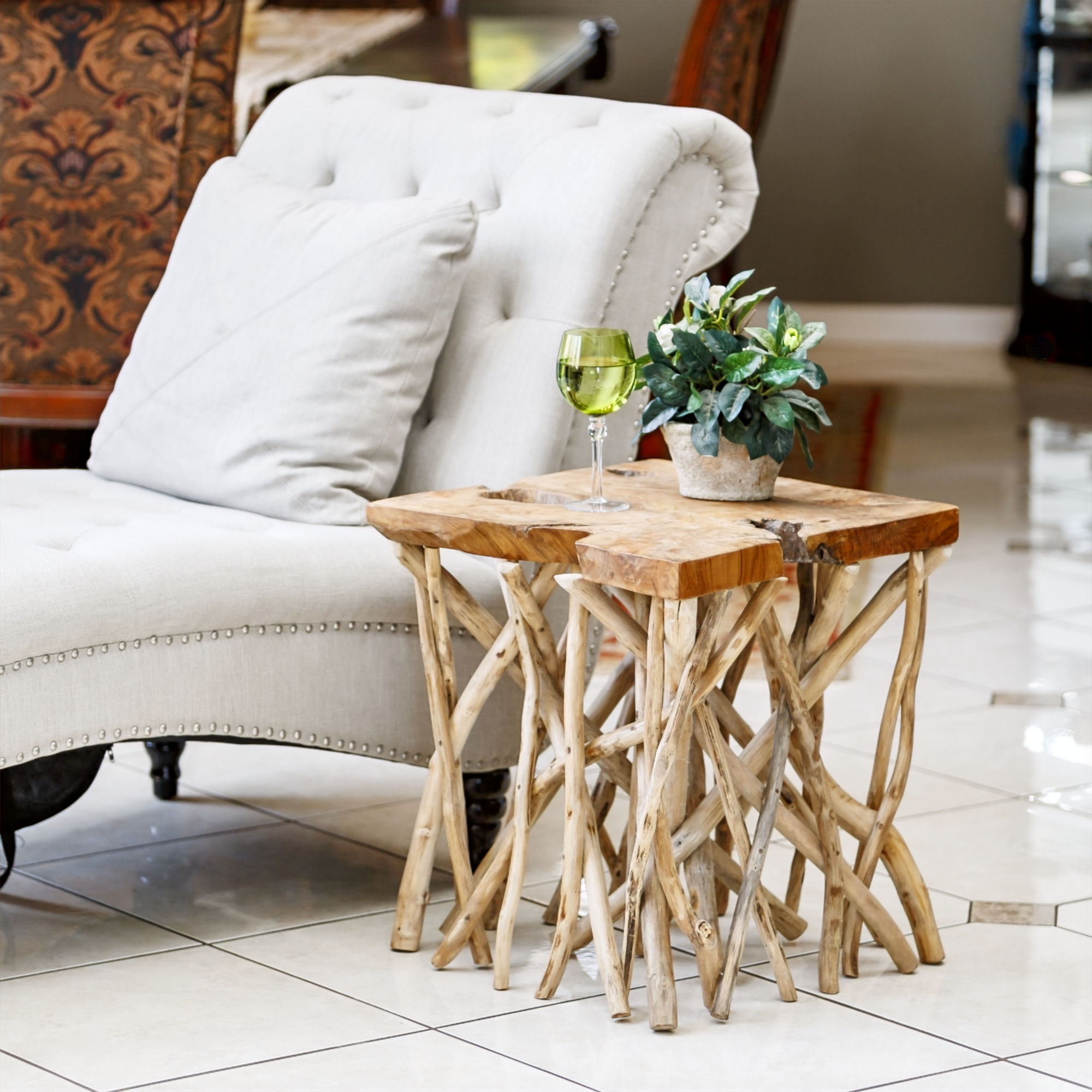 Handcrafted square teak branched-out table in a modern living room setting. Teak Wood End Table For Sale. Home and Garden Zen