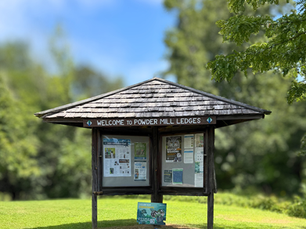 Powder Mill Ledges Wildlife Refuge entrance sign in Smithfield, Rhode Island