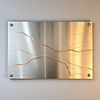 Brushed metal plaque with wavy copper lines mounted on wall.