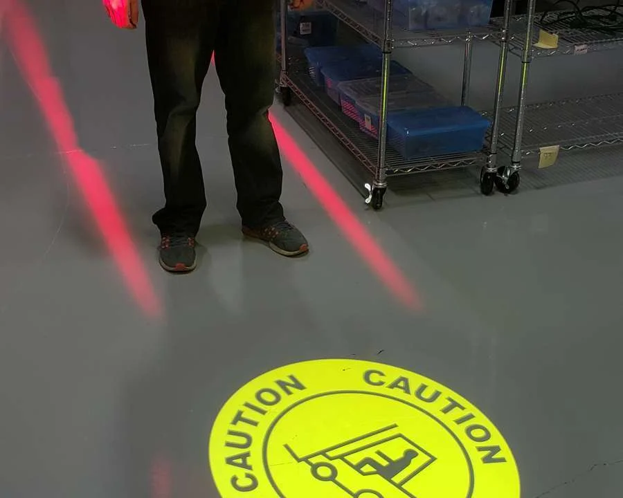 Laserglow's Projected Caution Sign