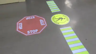 SafetyCast Pedestrian Awareness Signs "Caution" and "Stop" and Projected Walkways