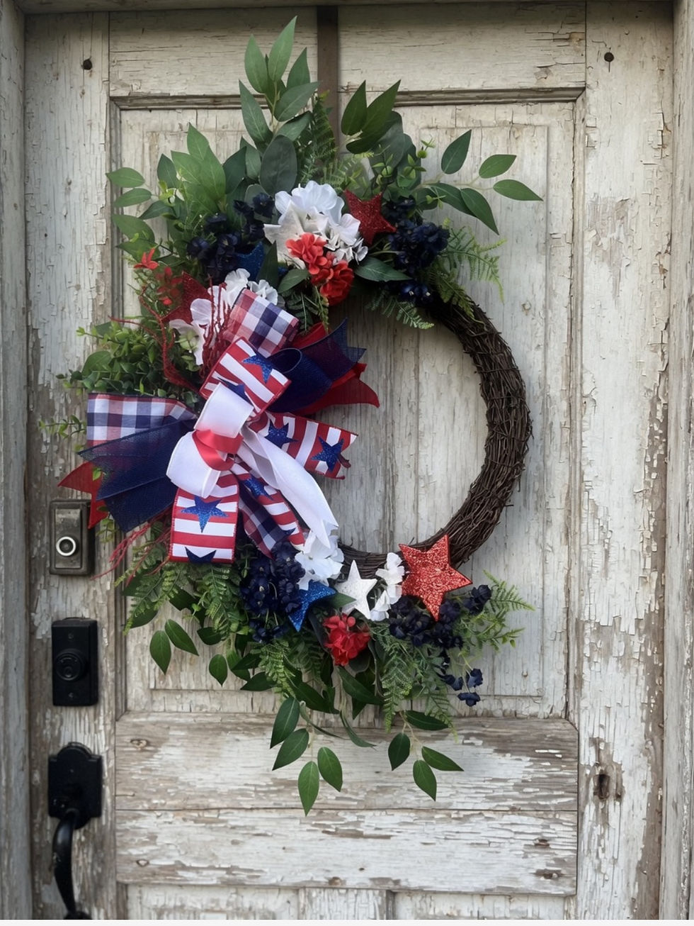 Patriotic wreath on a white door
