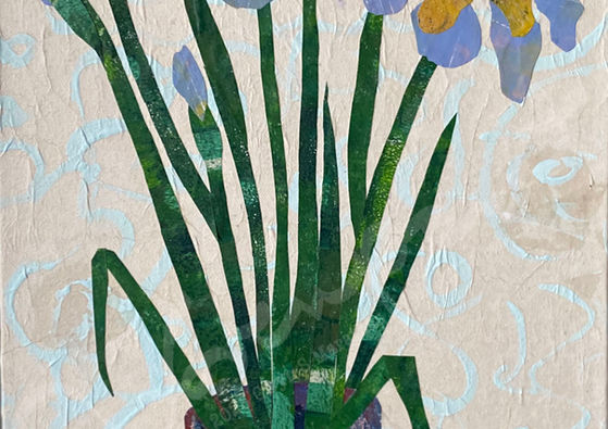vase of irises on table