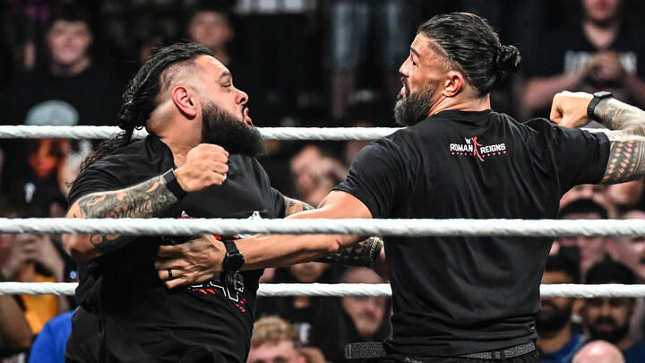 Bronson Reed and Roman Reigns are going to blows at each other after having a confrontation before this transpired. (Photo by WWE)