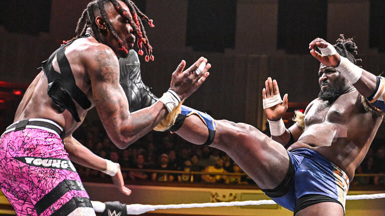 WWE NXT Champion Oba Femi is hitting a big-boot on the face of his challenger in Je'Von Evans whom he defeated at WWE Heatwave to retain his WWE NXT Title. (Photo by WWE)