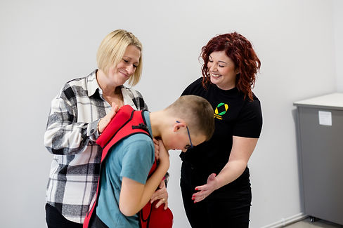 Small business owner captured naturally with their client during a photoshoot in Essex