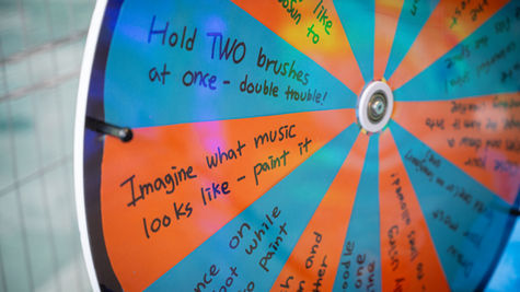 spinning wheel of text, blue and orange segments