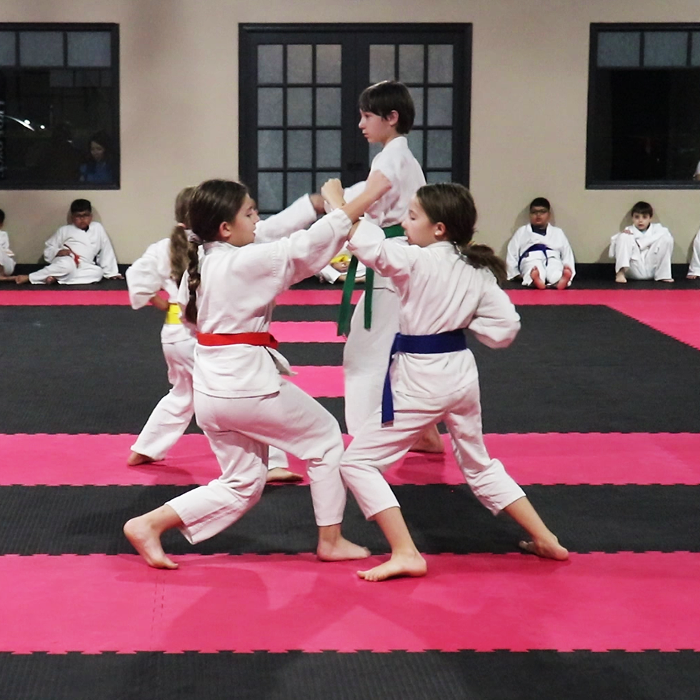 karate kids working on their self defense