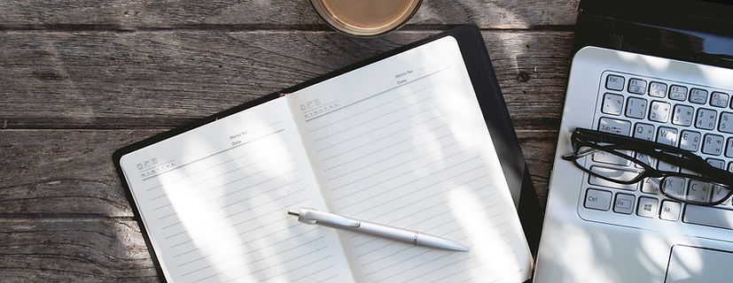 Laptop and Diary Topview