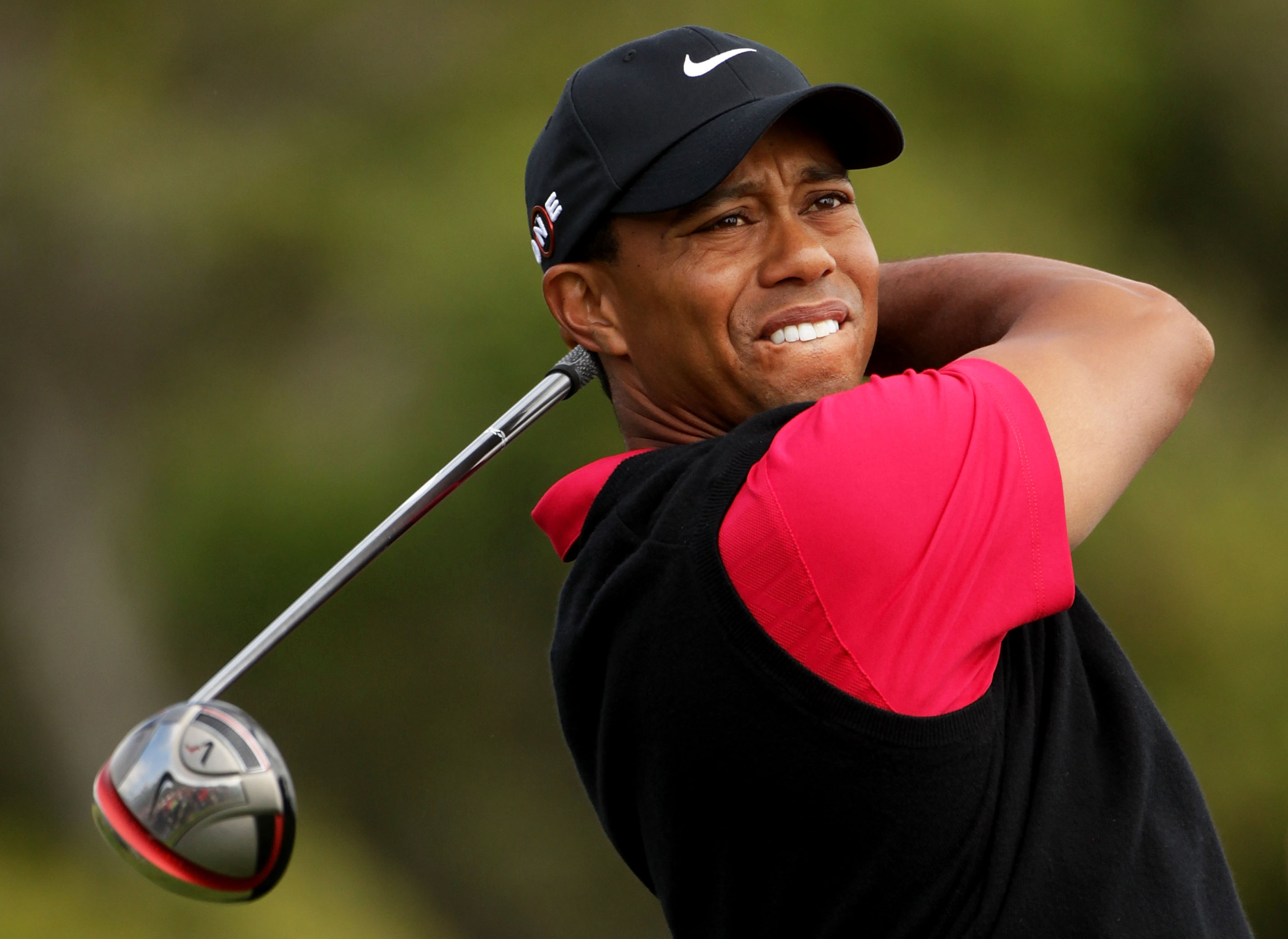 Tiger Woods . Golf