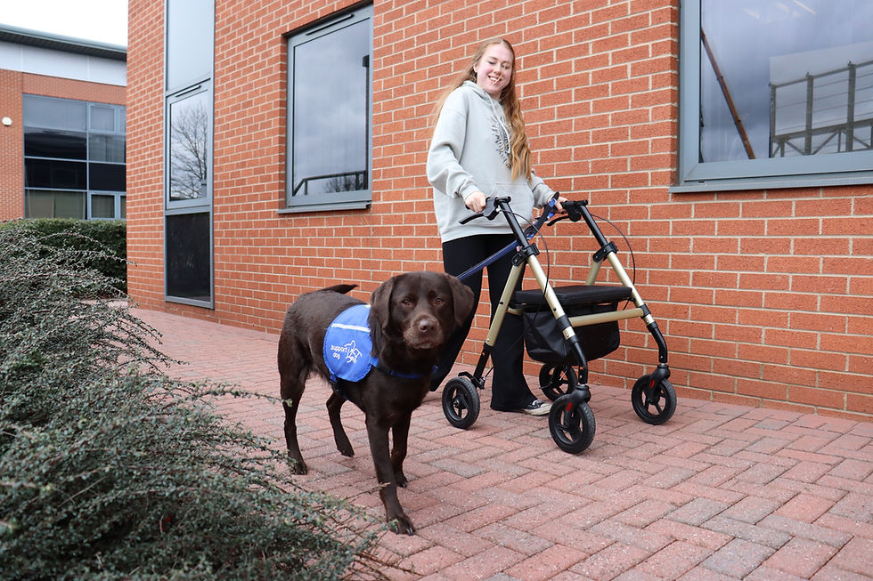 Ruby Trueman and her assistance dog Hope, who have both been supported by the Support Dogs charity.