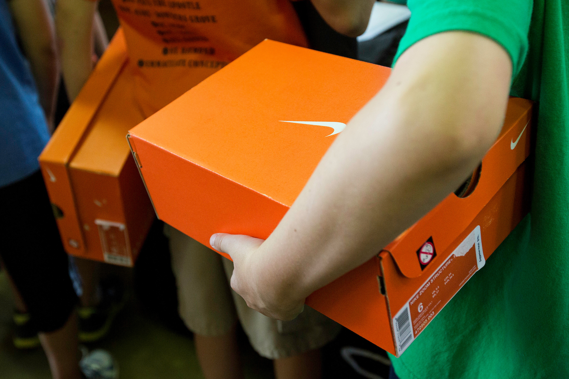 Campers receiving their free Nike shoes