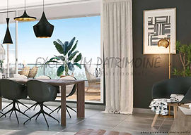Salon spacieux et lumineux d'un appartement T4 moderne, avec une décoration contemporaine,