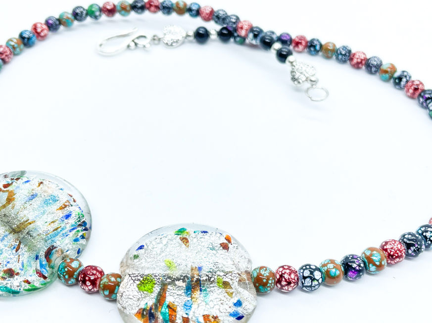 Beaded Necklace with clear resin flat beads and patterned and multi colored  resin beads.