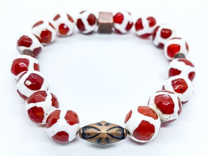 women's red and white beaded bracelet