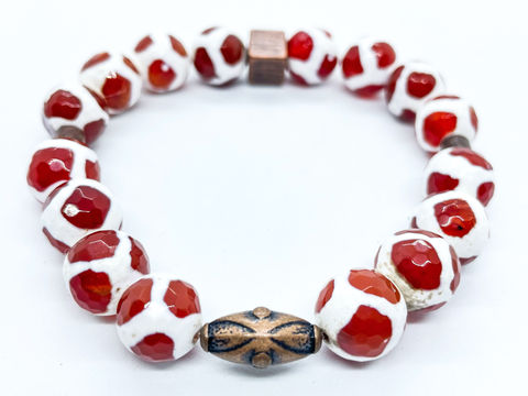 women's red and white beaded bracelet