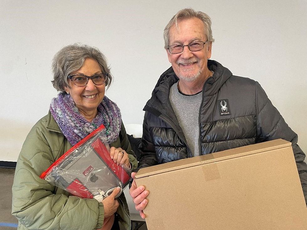 Glen and Teresa Case seen above receiving devices from LOSRC WestNGN Helene Technology Recovery Program.