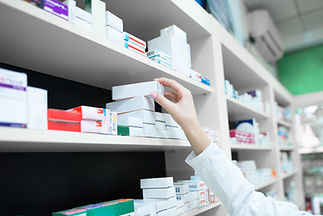 closeup-view-of-pharmacist-hand-taking-m
