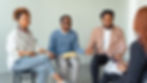 Group of people holding hands in a circle