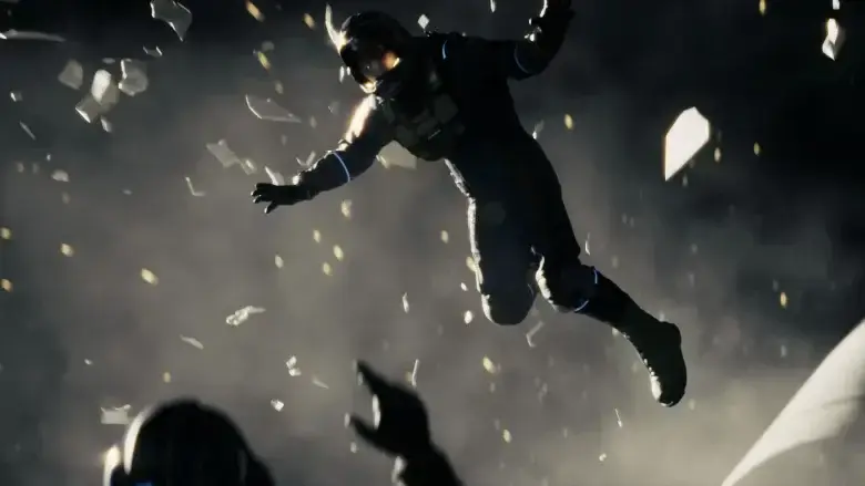 Astronaut drifting through a dark debris-filled scene, arms outstretched, with shattered fragments floating around.