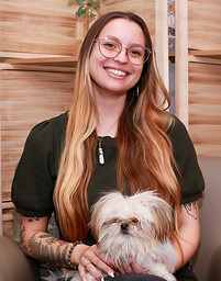 Therapist Sam with emotional support dog