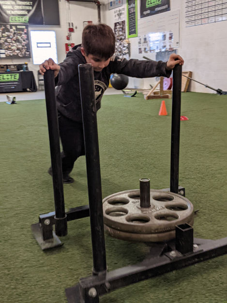 Elite Youth Athlete, Chase, working on his speed with these sled sprints 💨