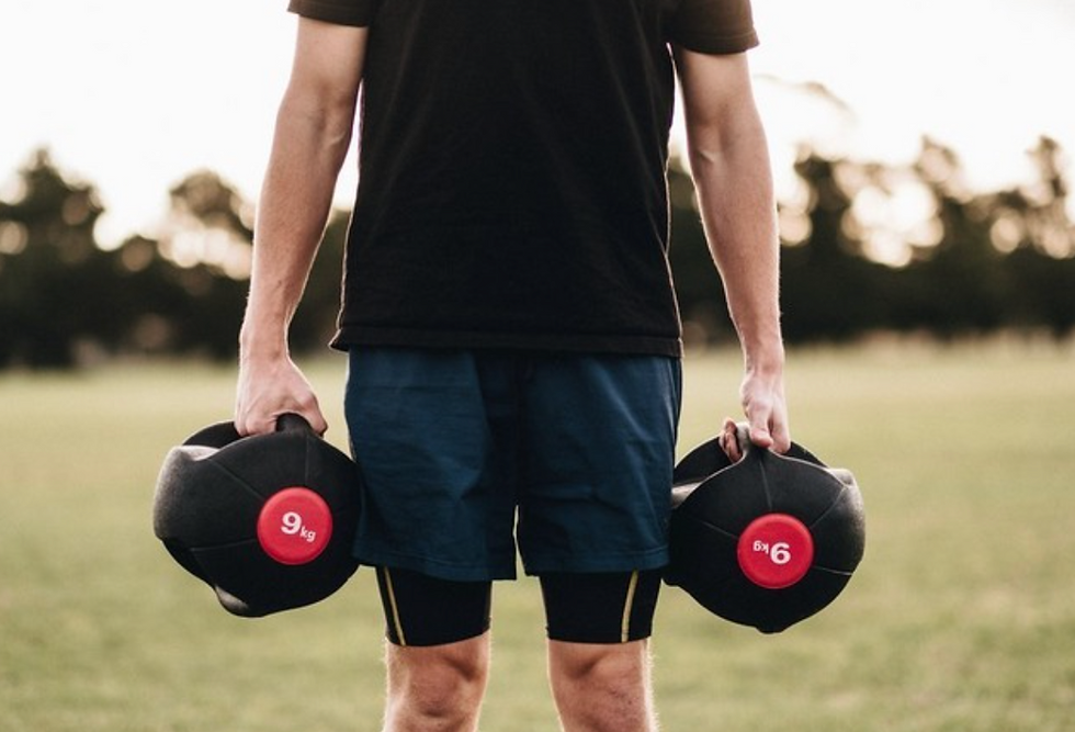 Man holding dumbbells