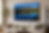 Thumbnail: Large custom canvas wall art print in Eagle, Idaho, displayed above a sofa with mountain lake photography.