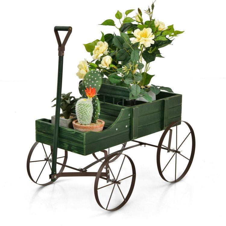 Wooden wagon planter with metal wheels in green color showing rustic garden cart design