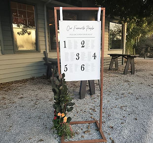 Buds n Roses, Hire item, Timber Stand to hang seating chart.jpg